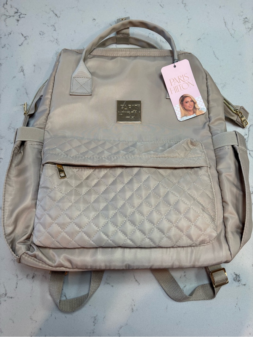 New Paris Hilton Quilted Cream Travel Laptop Backpack with Gold Accents